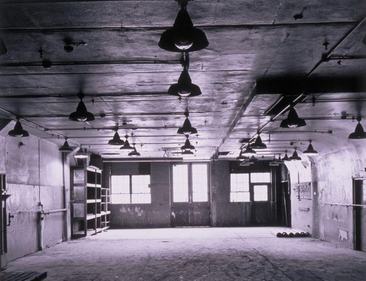 Sand Point Building 2.  Paint shop interior looking west.