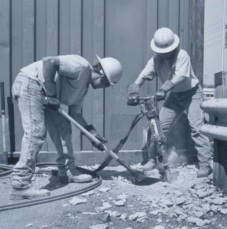 Marcus and Peg Breaking Ground for Utility Pole, 4th Avenue S. and S. Horton Street, Seattle