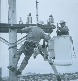 Cunningham and Reddy Installing Cross Arm, 6th Avenue S. and S. Holgate, Seattle