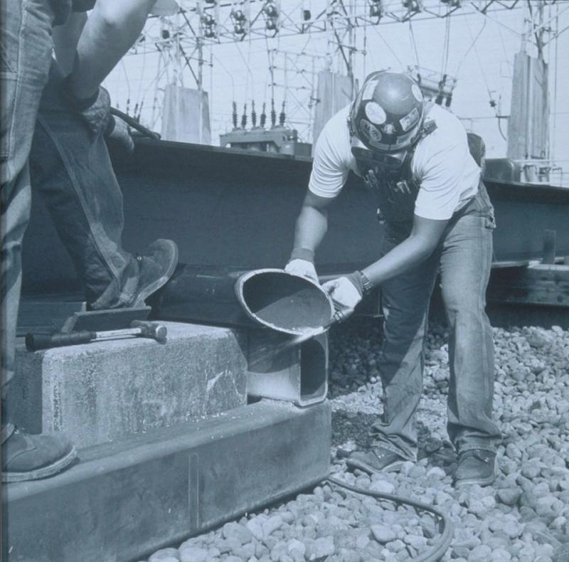 Robert and Tony Cutting Pipe for Transformer Platform, Duwamish Substation, Seattle