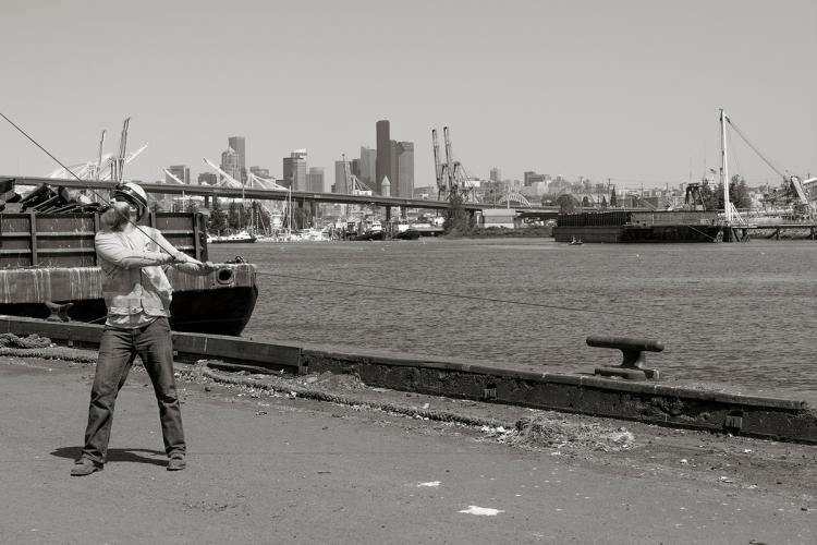 Pulling Cable across the East Duwamish with City Skyline