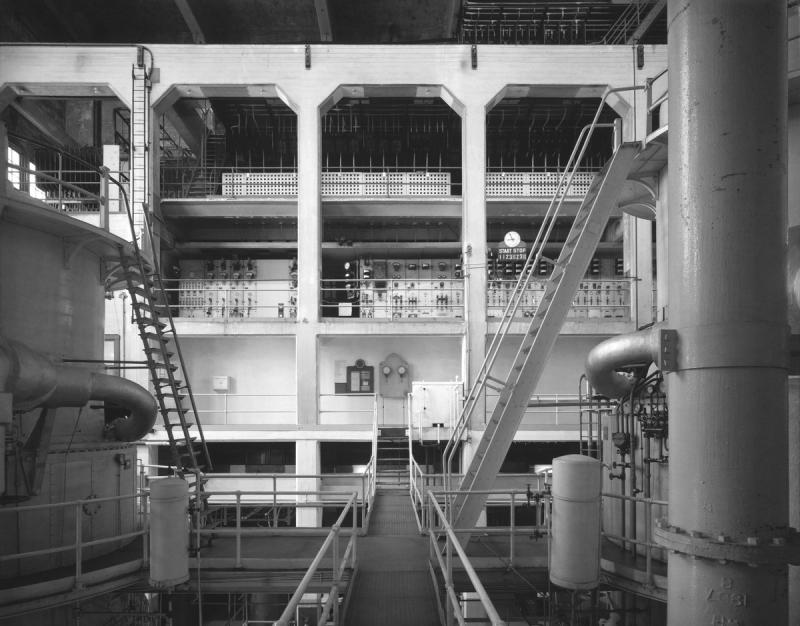 Georgetown Steam Plant, interior view looking north at electrical bays.  Operators switchboard one level up, turbine #1 to left, turbine #2 to right.